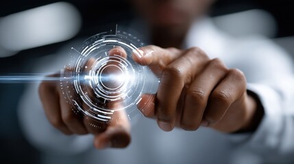 A person is pointing at a circle on a screen