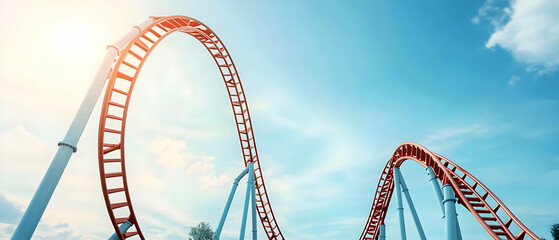 Red And White Roller Coaster Against Blue Sky