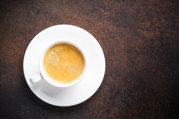 Coffee cup. espresso in white cup at dark table.