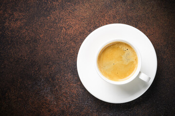 Coffee cup. espresso in white cup at dark table.