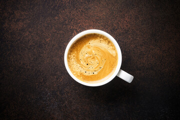 Coffee cup. espresso in white cup at dark table.