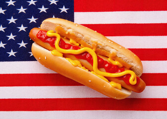 Patriotic Hot Dog with Mustard and Ketchup on American Flag Background for Hot Dog Festival Celebrations and Hot Dog Day Events