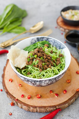 Green Noodles with Minced Chicken and Dumpling