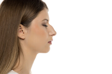 Naklejka premium Elegant Side View Portrait of a Young Woman, with humpback nose and closed eyes