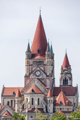 Detailed view of the striking neo-Romanesque St. Francis of Assisi Church, also known as the Kaiser Jubilee Church, located on Mexikoplatz in Vienna. 