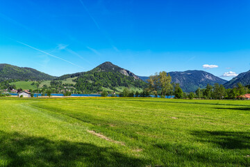 Fototapeta premium Hiking trail around Lake Schliersee in the bavarian alps at Schliersee, Upper Bavaria, Germany in Europe