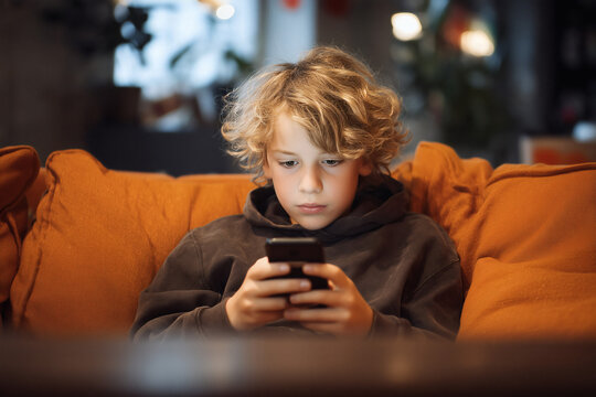 13-year-old boy watching YouTube