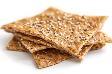 Fototapeta premium A close-up of two golden-brown flatbreads topped with sesame and poppy seeds, showcasing their delicious texture