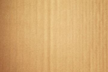 Fototapeta premium Gradient brown carton box kraft paper background texture with vertical lines