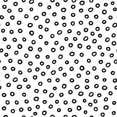 Vector seamless polka dot pattern. Hand drawn circles texture background. Hand drawn ornament for wrapping paper. Geometric pattern for wrapping paper.