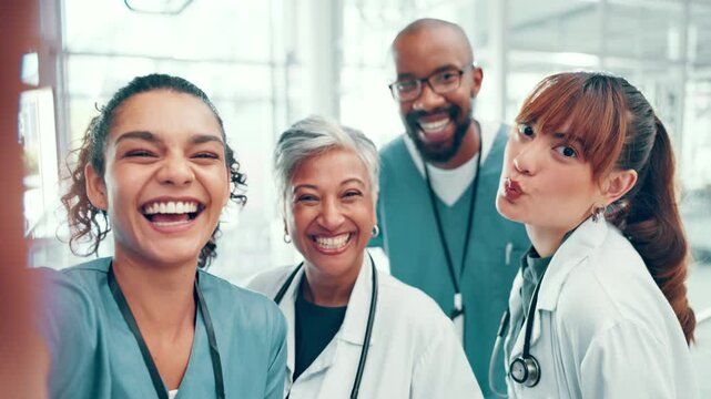Medical people, doctors and nurses in face selfie with peace sign and laugh for social media post in hospital. Man, women and healthcare workers with photo for about us, online platform and teamwork
