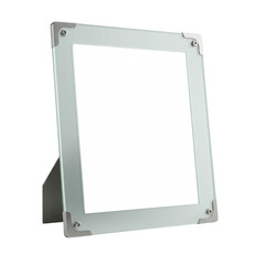 A pristine, glass photo frame with metal corners stands against a black background