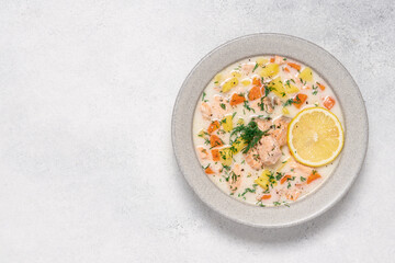 Salmon chowder cream soup lohikeitto. Traditional fish dish in Finland and other Nordic countries