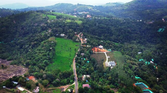 Ariel shot of tea plantations in vagamon, Kerala, India. Vagamon is a hill station located in Kottayam- Idukki border of Kerala	
