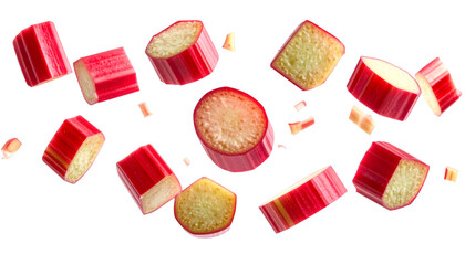 Fresh rhubarb stalks and slices flying on transparent background