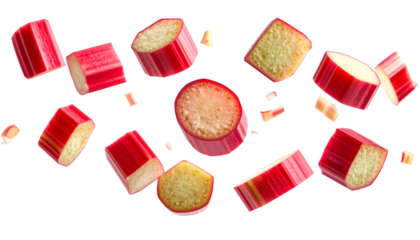 Fresh rhubarb stalks and slices flying on transparent background