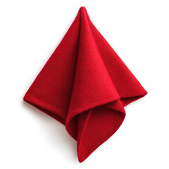 Bright red folded textile, featuring a triangular shape, soft texture, and shadows