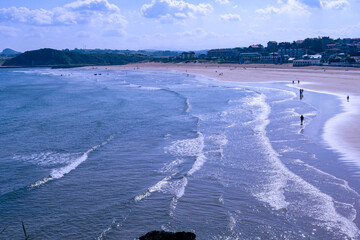 Waves at the beach on a sunny evening