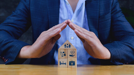 Health Insurance and medical care concept, wooden blocks displaying health related icons, medical...