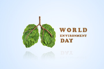 Mock-up in the shape of human lungs made of green leaves on a blue background. Beat plastic pollution. World Environment day concept. Happy Environment day, 05 June. Ecology concept. Concept of fresh