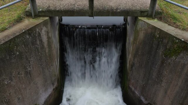 Water flowing over a culvert overflow