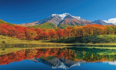 Autumnal mountain lake with vibrant fall colors reflected in still water