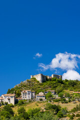 Trigance castle overlooking the village in Provence, France, under blue summer sky