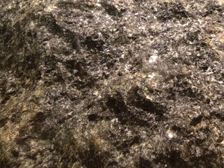 Dark Wet Rock Texture with Pyrite Flecks