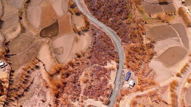 Aerial view of winding road in Drass farming land
