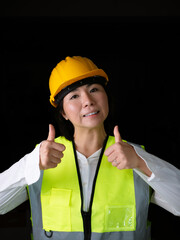 factory woman workers or technicians civil Engineer or Architecture project management give thumb up.