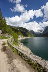 Vorderer Gosausee and Dachstein glacier reflecting in the lake in Gosau, Austria