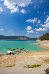 Yesa reservoir showing ruins of old town of Sigues emerging from water during drought in Spain