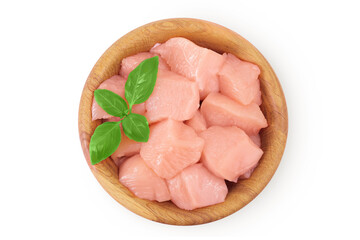 Raw diced chicken fillet in wooden bowl isolated on white background. Top view. Flat lay