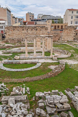 Old ancient ruins of the Hadrian's Library in downtown Athens, Greece on a cloudy day.