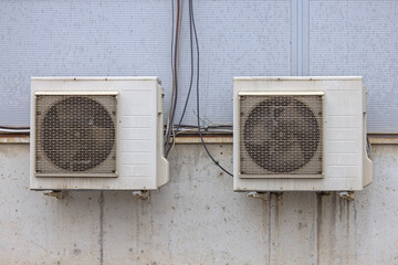 Two Split System Air Conditioners Wall Mounted Exterior Units