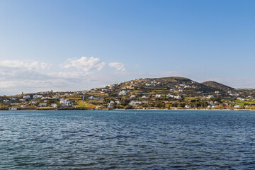 View of houses on the hill in Krotiri village by the Aegean Sea near Paroikia (Parikia) on Paros island in Greece on a sunny day.