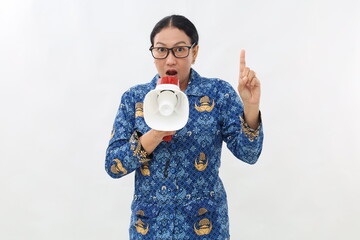 Strict civil servant woman of Asian hold scream in megaphone announces warning, point finger up...