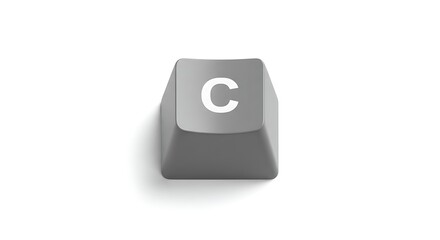Isolated gray 'C' key from a computer keyboard on white background
