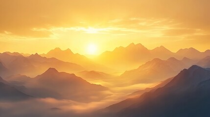 Obraz premium Sunrise over a mountain range with mist in the valleys