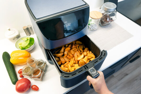 Air fryer machine in the kitchen