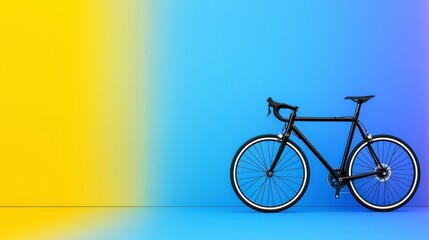 Fototapeta premium Black Road Bicycle on Yellow and Blue Background