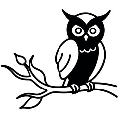 Cute black and white owl perched on a branch.