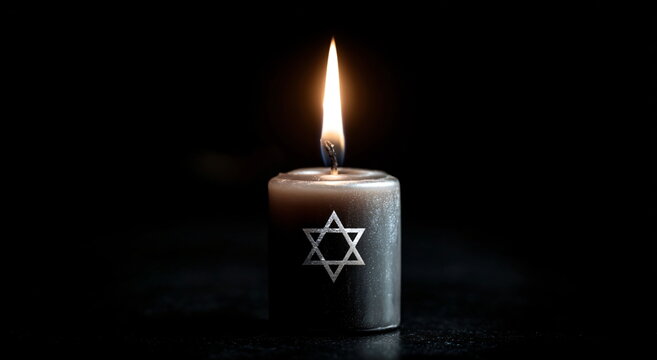 A burning candle in the foreground with a blurred Star of David in the background, representing jewish faith, tradition, and spirituality