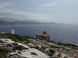 old lighthouse on the coast of amorgos