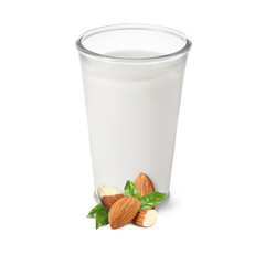 Nut milk in glass and almonds isolated on white