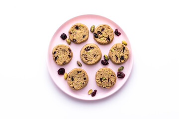 Tasty round homemade healthy biscuit made of oats, butter, nuts and dried fruits