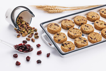 Tasty round homemade healthy biscuit made of oats, butter, nuts and dried fruits