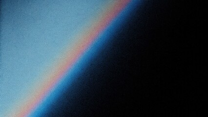 A colorful rainbow transitions across a grainy light blue texture toward a black space evenly