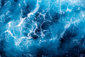 Ocean water background. Top view of stylish foamy water. Can be used in covers, packaging, posters, textures, presentations, art and design projects. Picturesque nature background image.