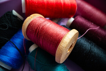 Closeup of multicolor spools of thread